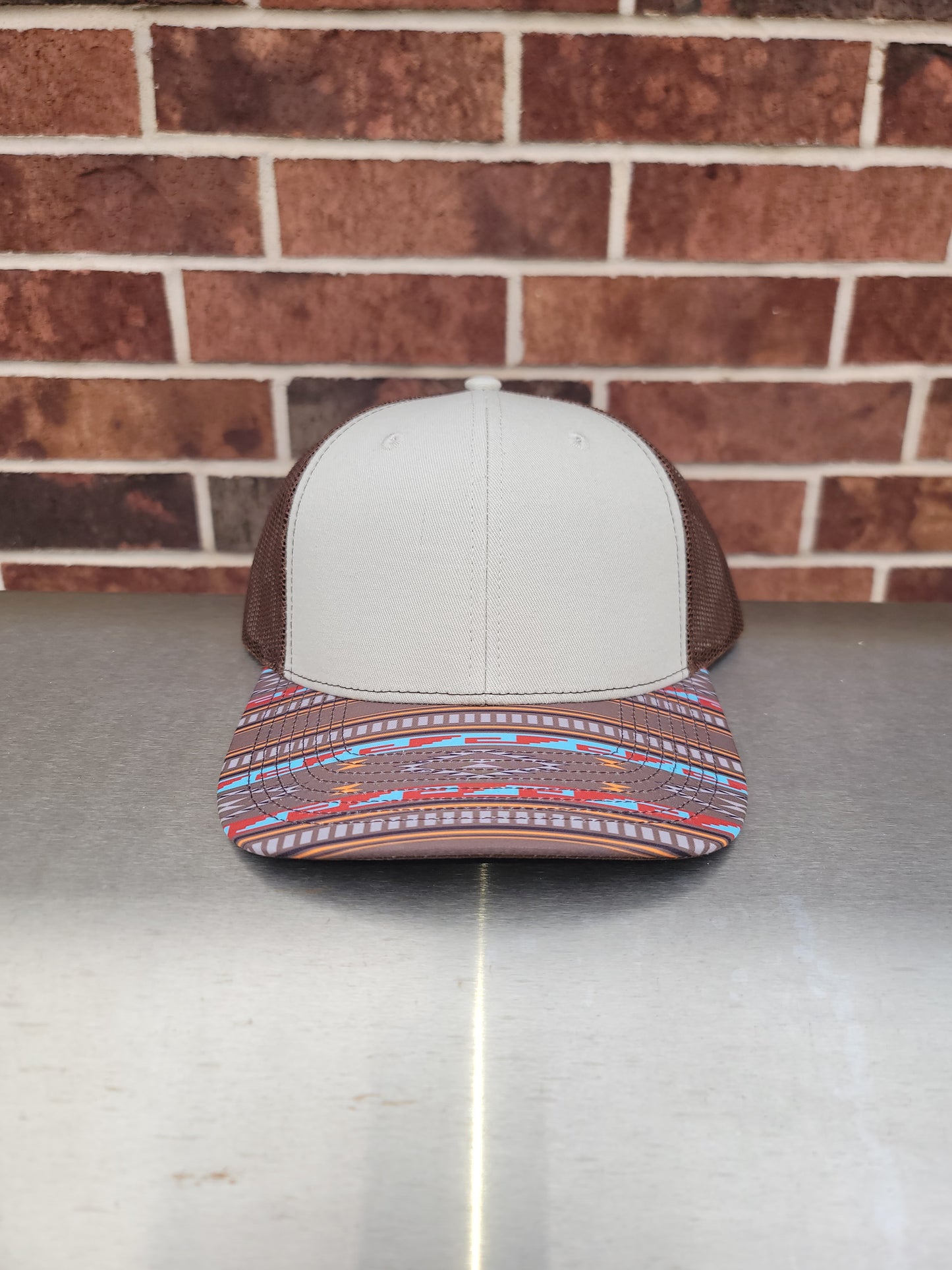 Trucker cap with southwestern style bill